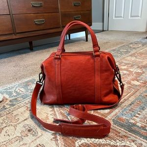 100% leather Madewell handbag, reddish-orange color. Hardly used.